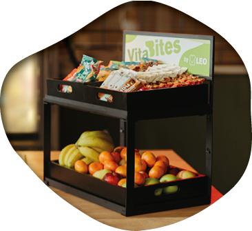A black shelf with a variety of fruits and snacks on it. AI generated content