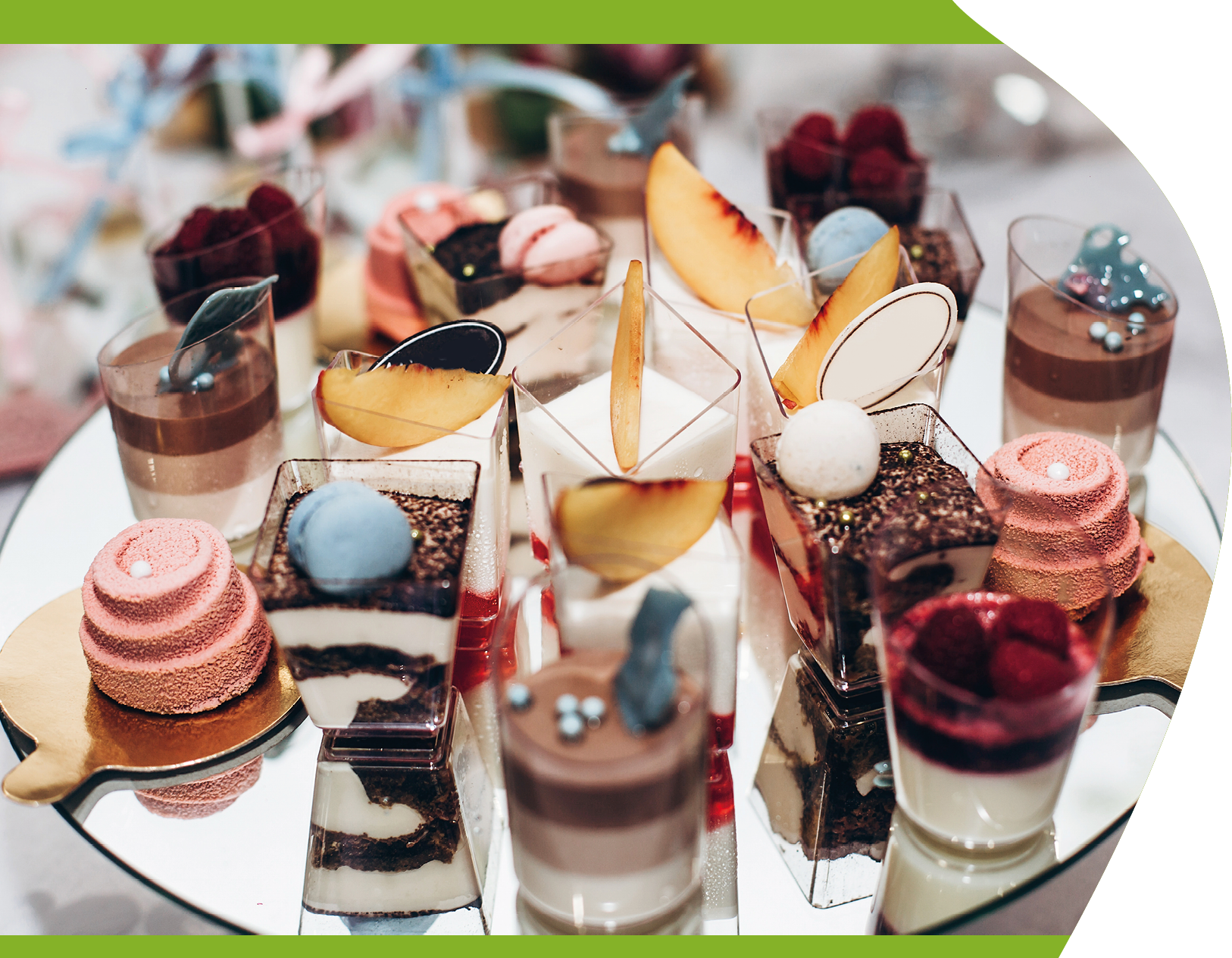luxury wedding catering, table with modern desserts, cupcakes, sweets with fruits. delicious candy bar at expensive wedding reception. space for text. shower. holiday celebration