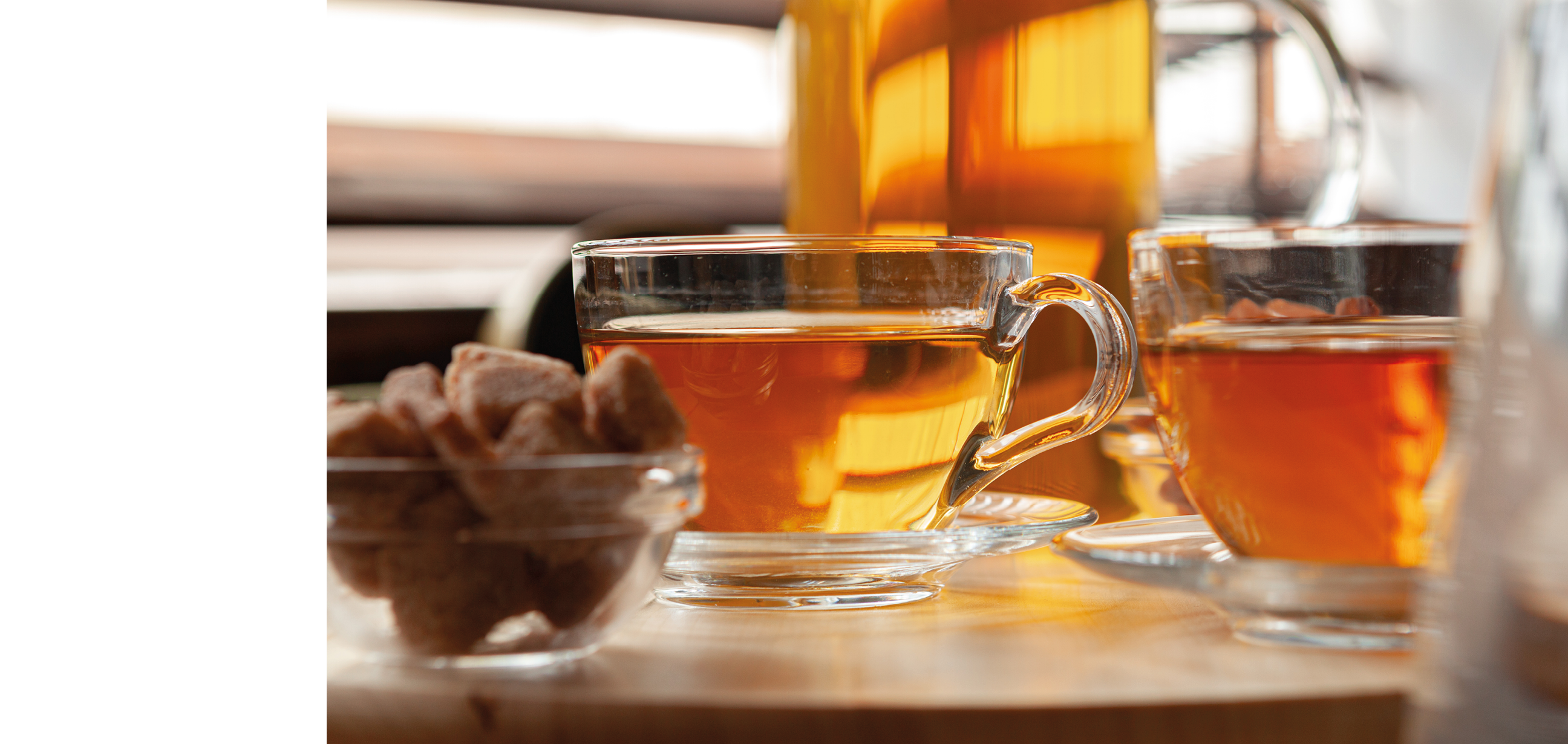 Hot refreshing citrus tea in glass close up