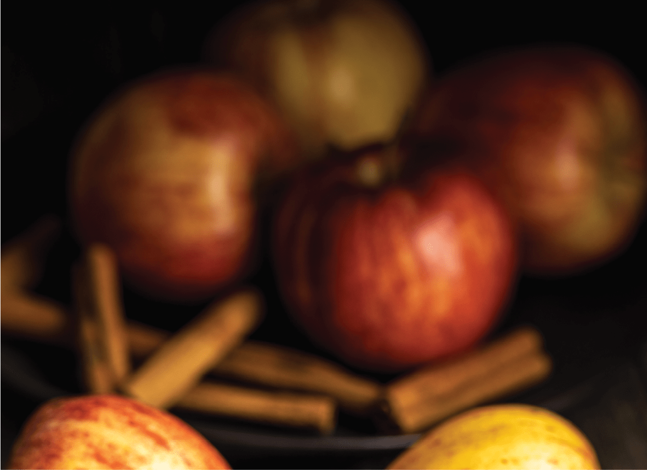 Fresh autumn apples on wooden table.