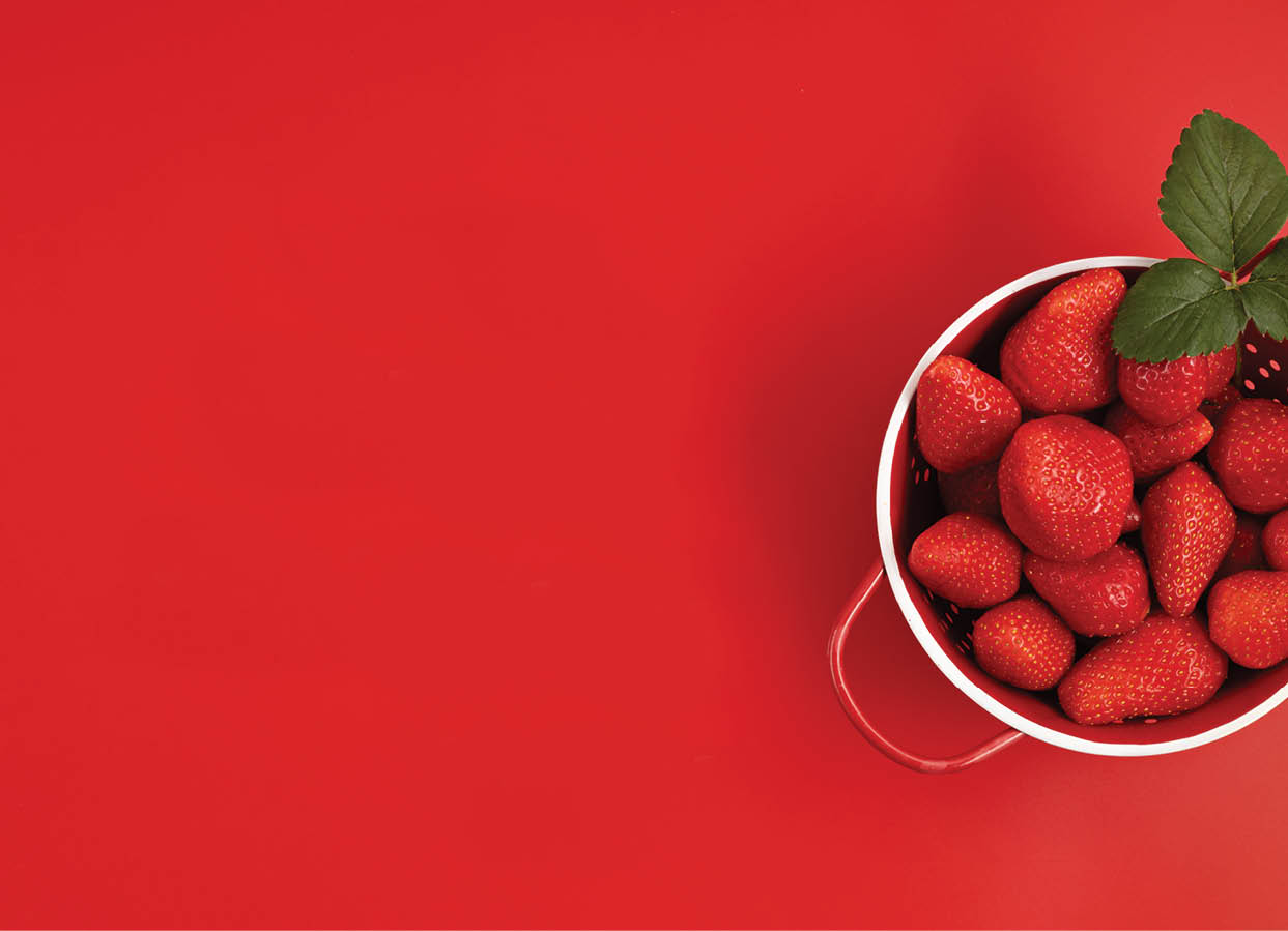Top veiw of fresh and juicy strawberry and text hello summer on red background. Summertime, red fruits, vitamins, buy local, organic berries concept. Flat lay, copy space