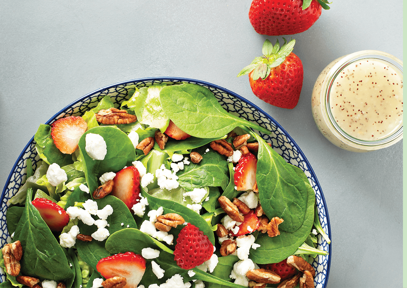 Fresh strawberries, spinach and goat cheese salad