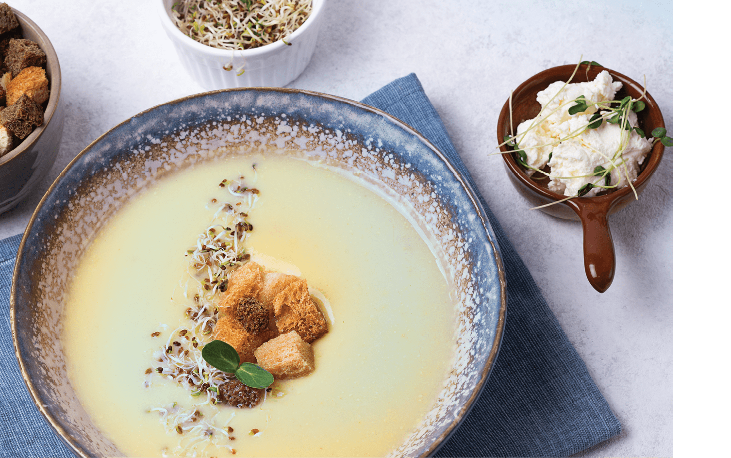 Healthy vegetarian cream soup made from vegetables, squash puree soup in a plate on a white background, close-up.