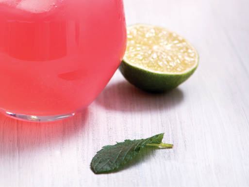 Refreshing summer rhubarb lemonade drink with lime and mint