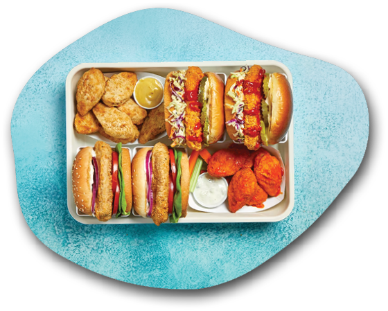 A tray of food on a blue table. Description generated by AI