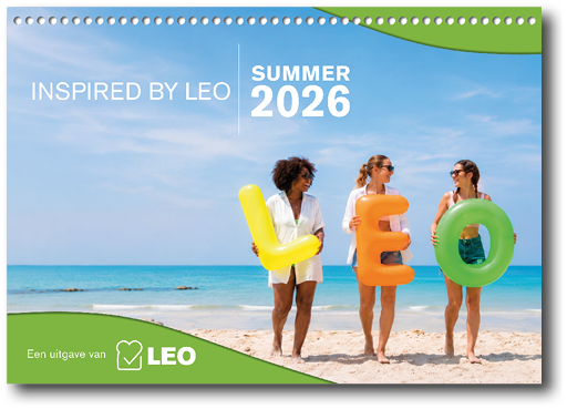 Three women standing on a beach. Description generated by AI