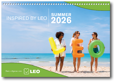 Three women standing on a beach. Description generated by AI