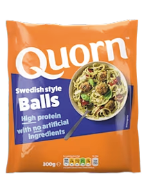 Quorn Swedish style Balls packaging with a bowl of noodles and meatballs on an orange background highlighting high protein and no artificial ingredients. Description generated by AI