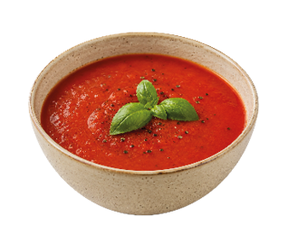 A bowl of smooth red tomato soup garnished with fresh basil leaves and sprinkled with black pepper. Description generated by AI