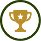 A gold trophy with a star in the center is enclosed within a dark green circular border on a white background. Description generated by AI