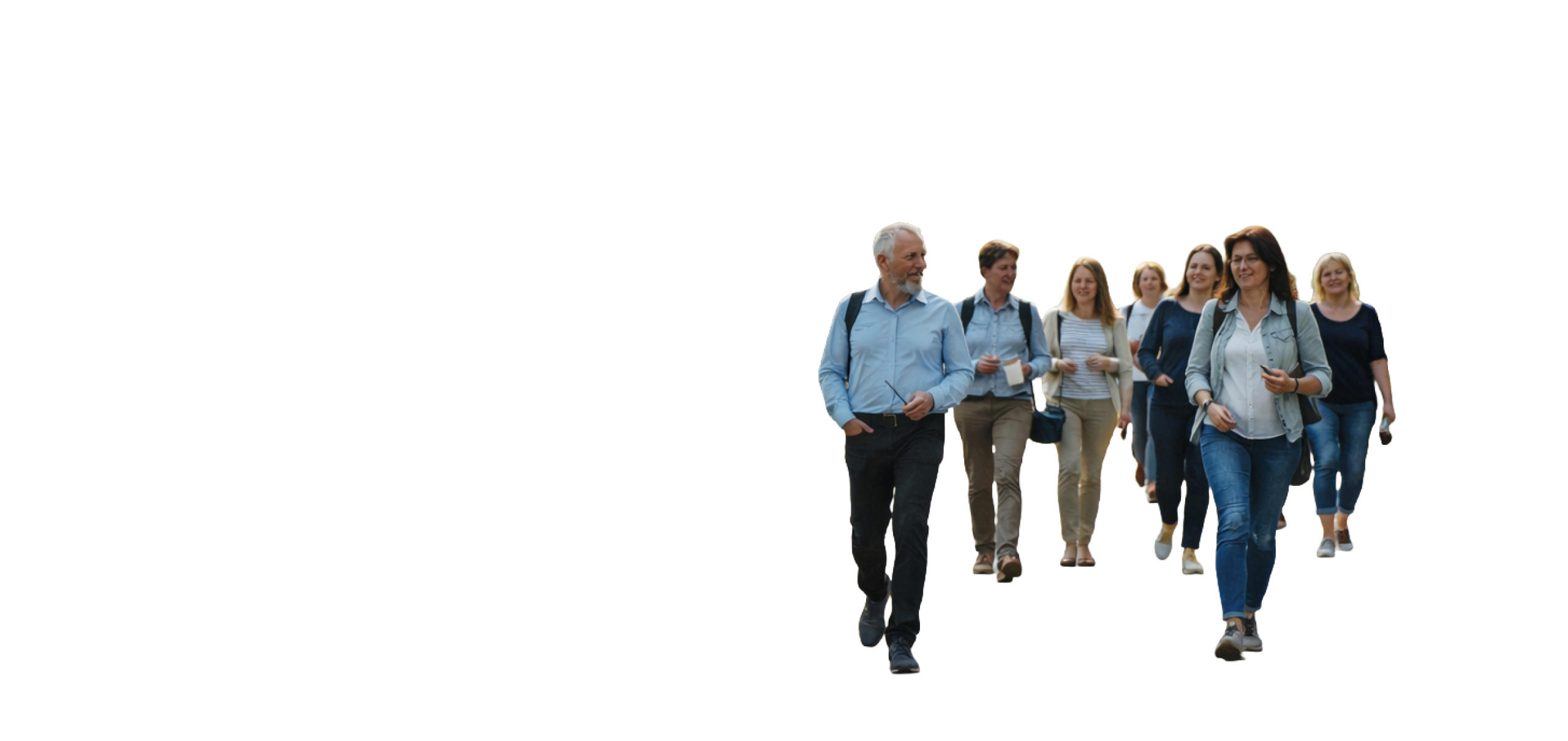 A group of people walking on a path. Description generated by AI