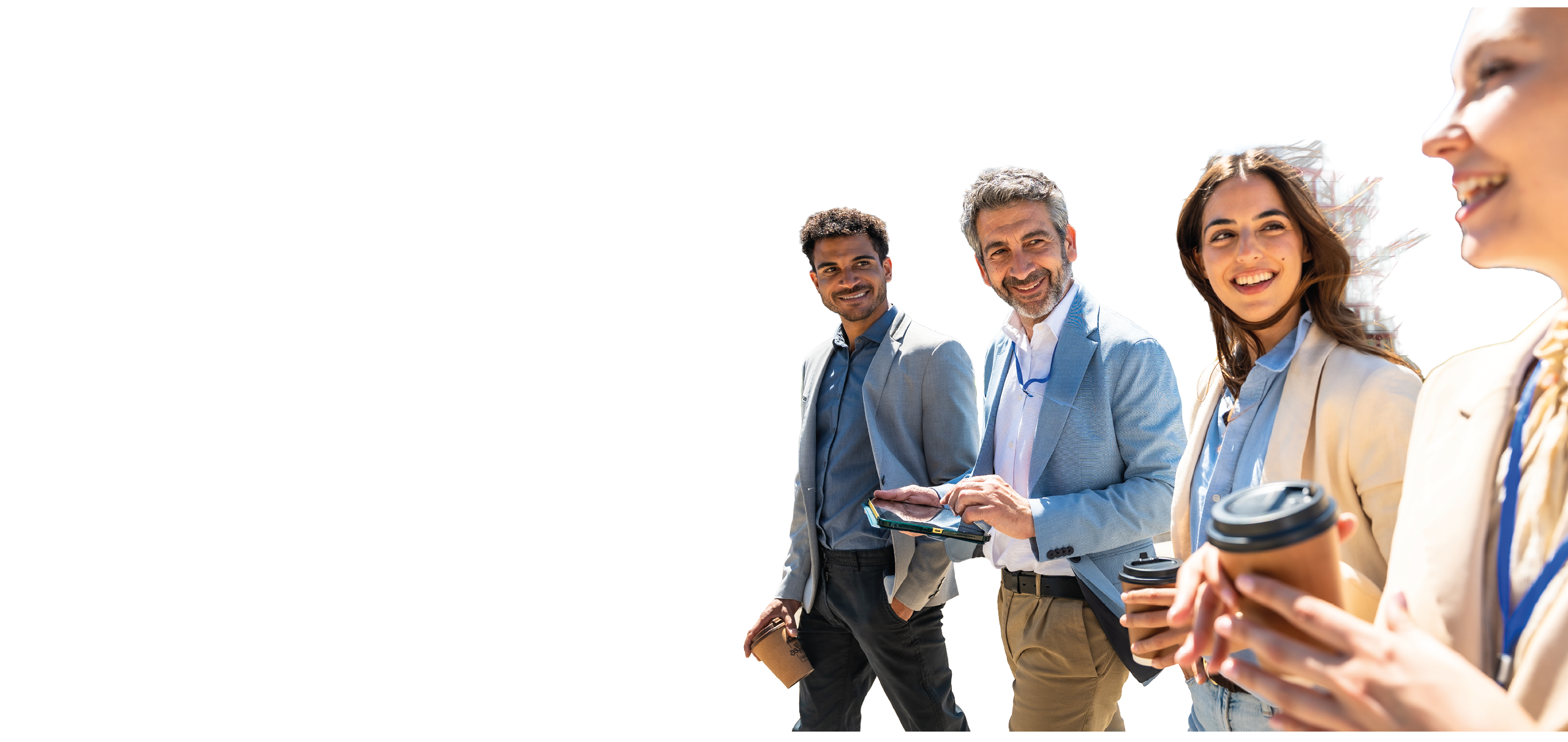 Three people standing on a sidewalk. Description generated by AI