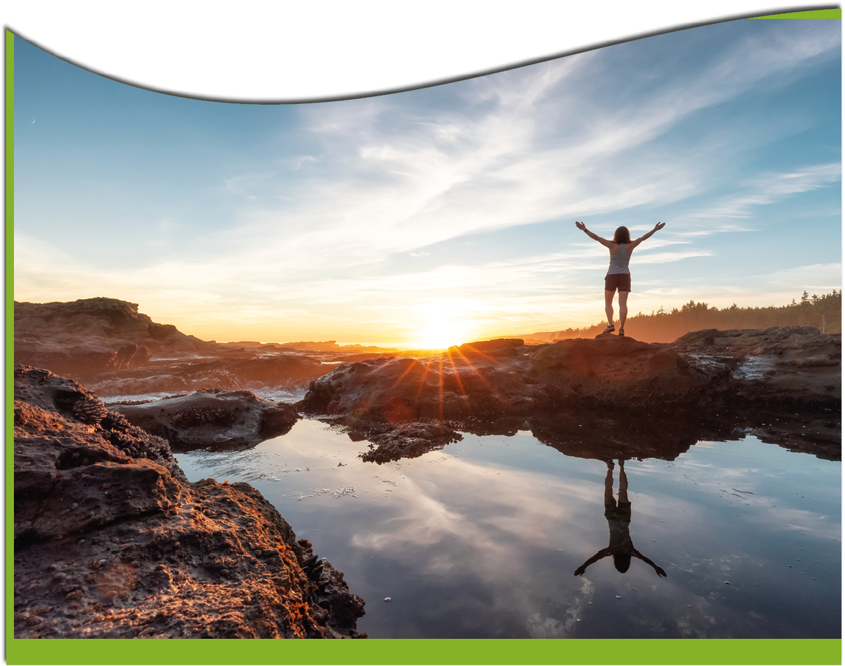 Adventurous Woman Hiking at Botanical Beach on the West Coast of Pacific Ocean. Summer Sunny Sunset. Canadian Nature Landscape Background. Port Renfrew near Victoria, Vancouver Island, BC, Canada.